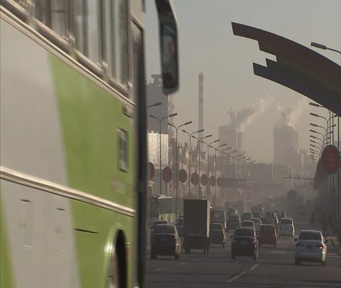 Beijing, China; WS traffic heading for Shen Hua Sanhe power plant in smog Stock Footage