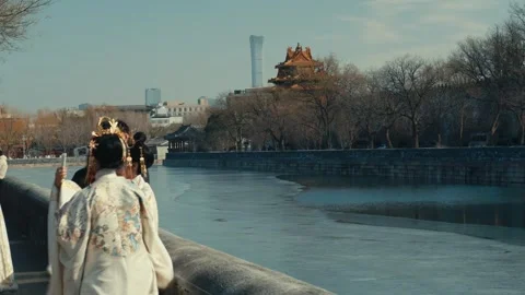 Beijing Forbidden City Corner Tower and Moat View with Women in Traditional Stock Footage 337451264