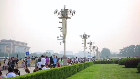 BEIJING-JUNE 24, 2017: Foreign tourist on sunny Tiananmen Square, one of the Stock Footage 83186212