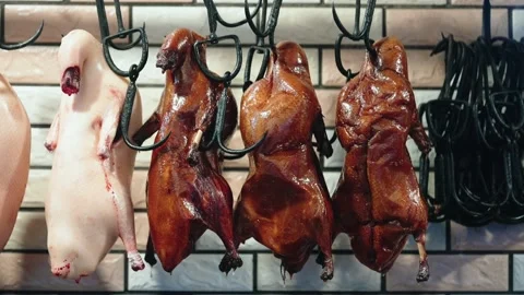 Beijing roast duck hanging on the hook Video stock 234981304