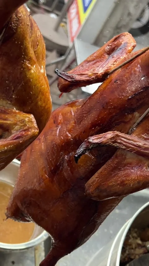 Beijing roast duck hanging on the hook Stock Footage 306681816
