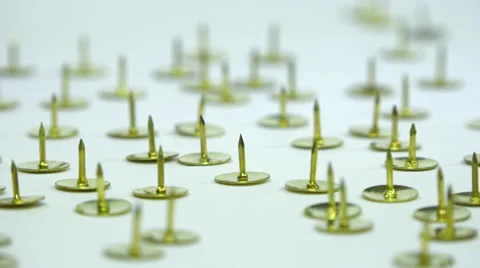 Being different : tacks - all pins spike up &amp; one pins spike down - panoramic Stock Footage 58031636