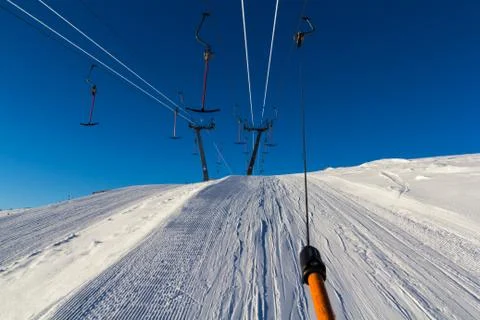 Being draged up the ski slopes Stock Photos