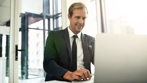 Being tech-savvy is an essential element of managing your business. Shot of a Stock Photos