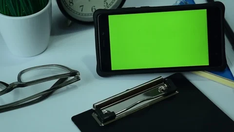 BEKASI, WEST JAVA, INDONESIA, APRIL 26, 2019 : Phone Green Screen lay in Stock Footage 106965274