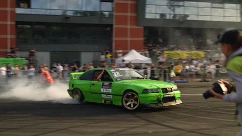 BELARUS 15.09.2024. BMW E36 warms up the tires in front of the spectators. Drift Stock Footage 287105249