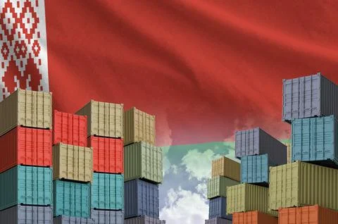 Belarus flag and big stack of shipping cargo containers in docks with sky イラスト素材
