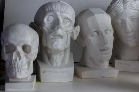 Belarus, Minsk, 16.04.2020 group classical plaster head bust against a white, Stock Photos