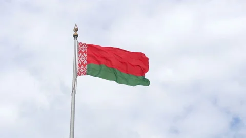 Belarusian flag is developing on the background of a cloudy sky Stock Footage 112065130