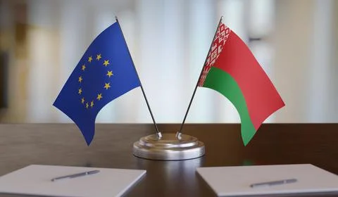 Belarussian and EU flags on table. Negotiation between European Union and Bel Stock-Fotos