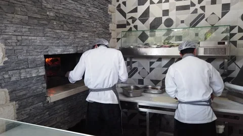 Belek, Turkey, 31 October-2021. Cafe, pizzeria. The staff works in the restau Stock Footage 171107922