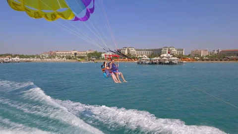 Belek, Turkey - September 27, 2023: Happy couple released into flight on a Stock Footage 252147338