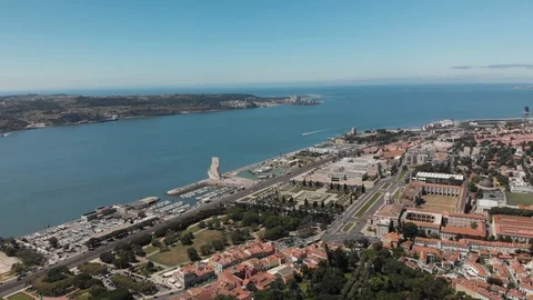 Belem district and Tagus river bank in Lisbon with touristic sights aerial view Stock-Footage 107991344