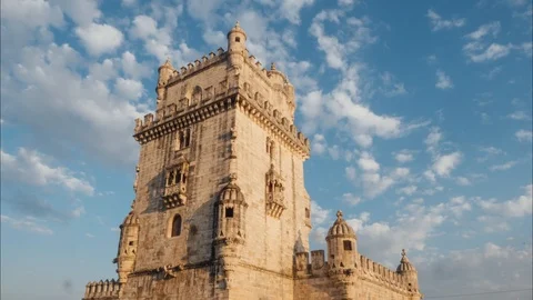 Belem tower is an ancient fort timelapse at sunset, Lisbon, Portugal Stock Footage 97720598