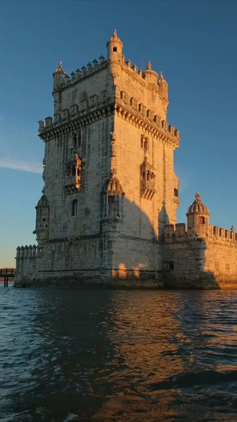 Belem Tower on the bank of the Tagus River on sunset. Lisbon, Portugal Stock Footage 344584330