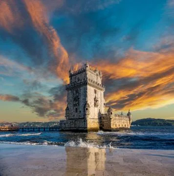 Belem tower under the sky at sunset 스톡 사진