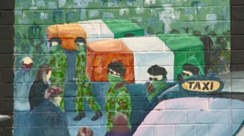 Belfast mural of paramilitary funeral Stock Footage 890868