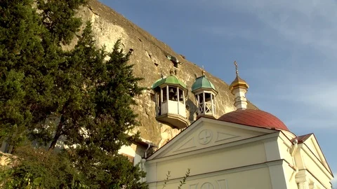 Belfry active cave monastery of St. Klimento at sunset. Video stock 106062252