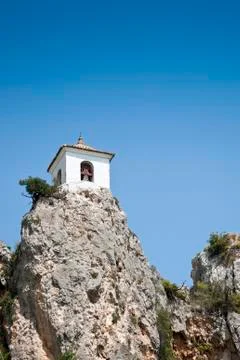 Belfry on the peak of the mountain Stock Photos