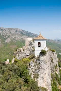 Belfry on the peak of the mountain. Stock Photos