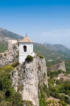 Belfry on the peak of the mountain Stock Photos