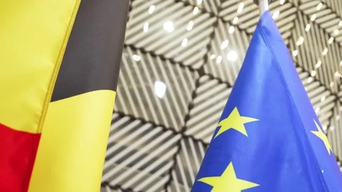 Belgian and European flags inside the European Council building in Brussels 動画素材 325494586