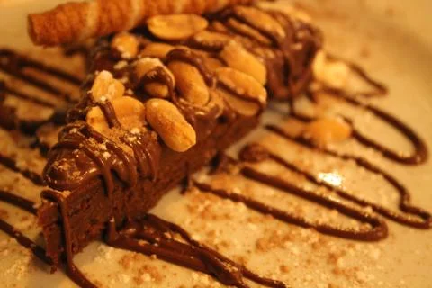 Belgian chocolate cake with peanuts Stock Photos