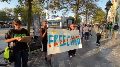 Belgian Congolese call for boycott of iPhone 16, Bruselas, BE - 20 Sep 2024 Stock Footage 285185560