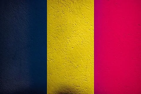 Belgian flag on the wall as background Stock Photos