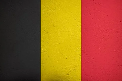 Belgian flag on the wall as background Stock Photos