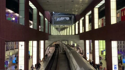 Belgian SNCB train leaves platform at Antwerpen central train station Stock Footage 201296017