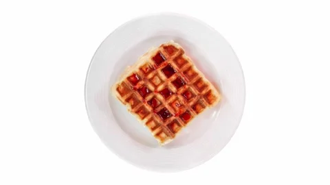 Belgian waffle with cherry jam on plate, rotating Stock-Footage 255036455