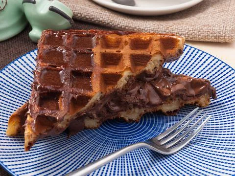 Belgian waffle with chocolate paste. Concept: Breakfast Foto stock