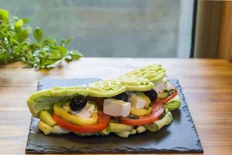 Belgian waffle with salad Foto stock