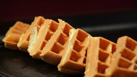 Belgian waffle wedges from breakfast brunch buffet Stock Footage 120406702