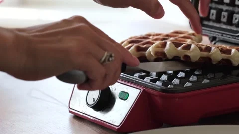Belgian waffles baking in a waffle iron Stock Footage 245332800