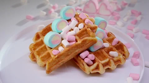 Belgian waffles with colored marshmallows. Belgian waffle decorated with variety Stock Footage 270432561