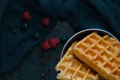 Belgian waffles on a dark background Foto stock