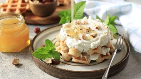 Belgian waffles gluten free with nuts and ricotta. Stock Footage 243452491