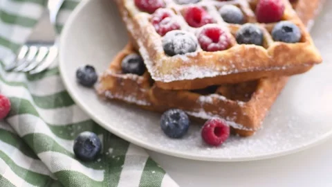 Belgian waffles on plate with berries Stock Footage 137537541