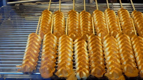 Belgian waffles in shape of braids on sticks Stock Footage 122077017