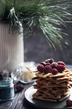 Belgian waffles stack with blackberries on top Stock Photos
