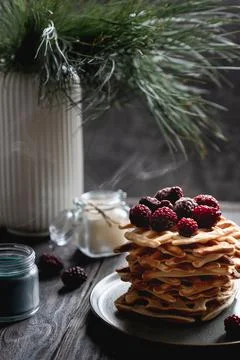 Belgian waffles stack with blackberries on top Stock Photos