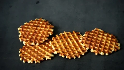 Belgian waffles. waffles on black background. sweet products. Stock Footage 99400986