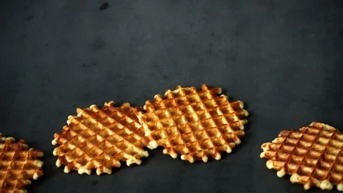 Belgian waffles. waffles on black background. sweet products. Stock Footage 99400996