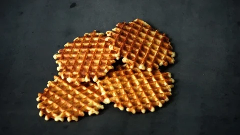 Belgian waffles. waffles on black background. sweet products. Stock Footage 99401001