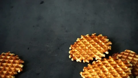 Belgian waffles. waffles on black background. sweet products. Stock Footage 99401010