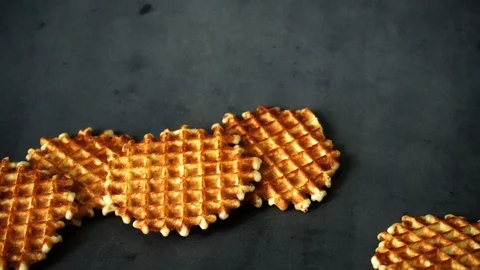 Belgian waffles. waffles on black background. sweet products. Stock Footage 99401016