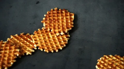 Belgian waffles. waffles on black background. sweet products. Stock Footage 99401018