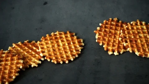 Belgian waffles. waffles on black background. sweet products. Stock Footage 99401026